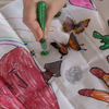 Decorating kites for the wedding.